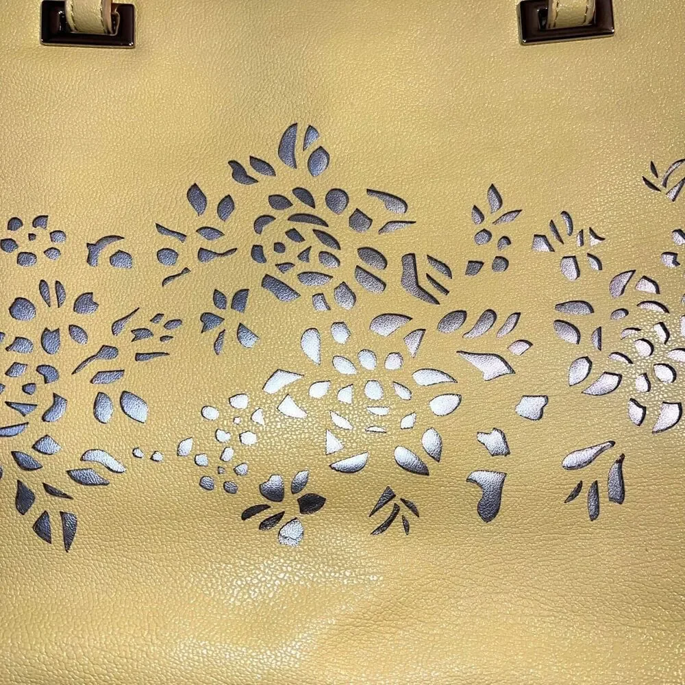 Nine West Ava Faux Leather Tote Bag Purse Floral Laser Cut Design Yellow Silver